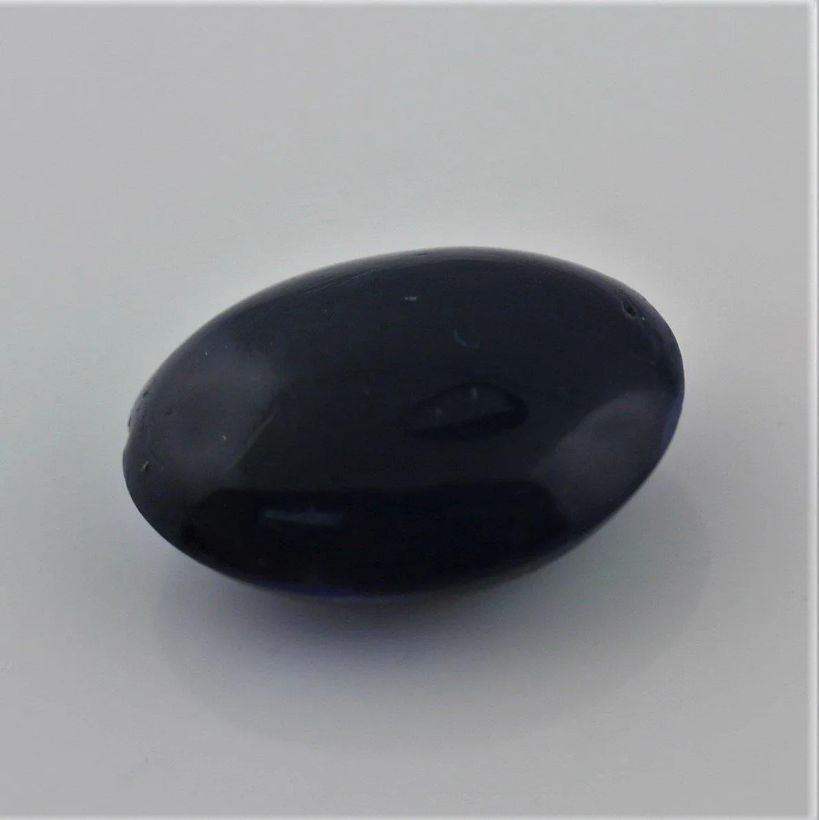 5.49 carat Bright Black Opal Oval Cabochon