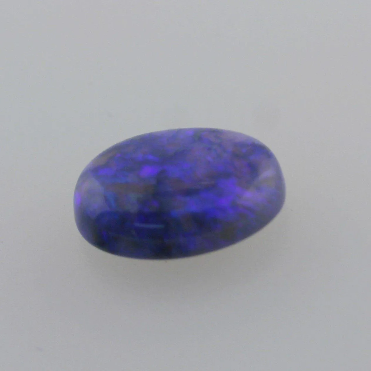 6.03ct Australian Bright Black Opal Oval Cabochon Semi Crystal